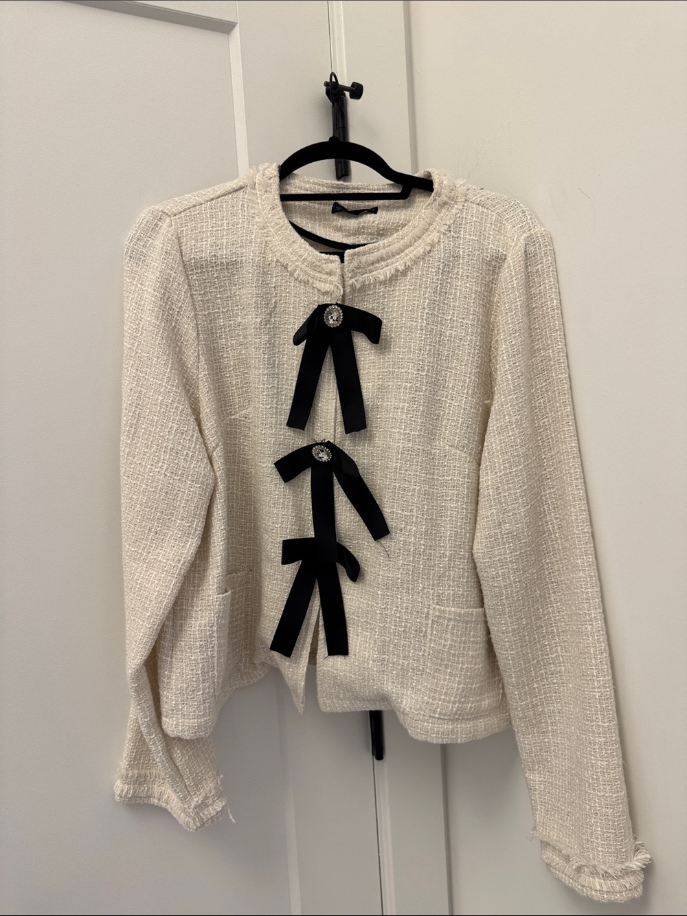 Elegant Cream Tweed Jacket with Black Bow Accents